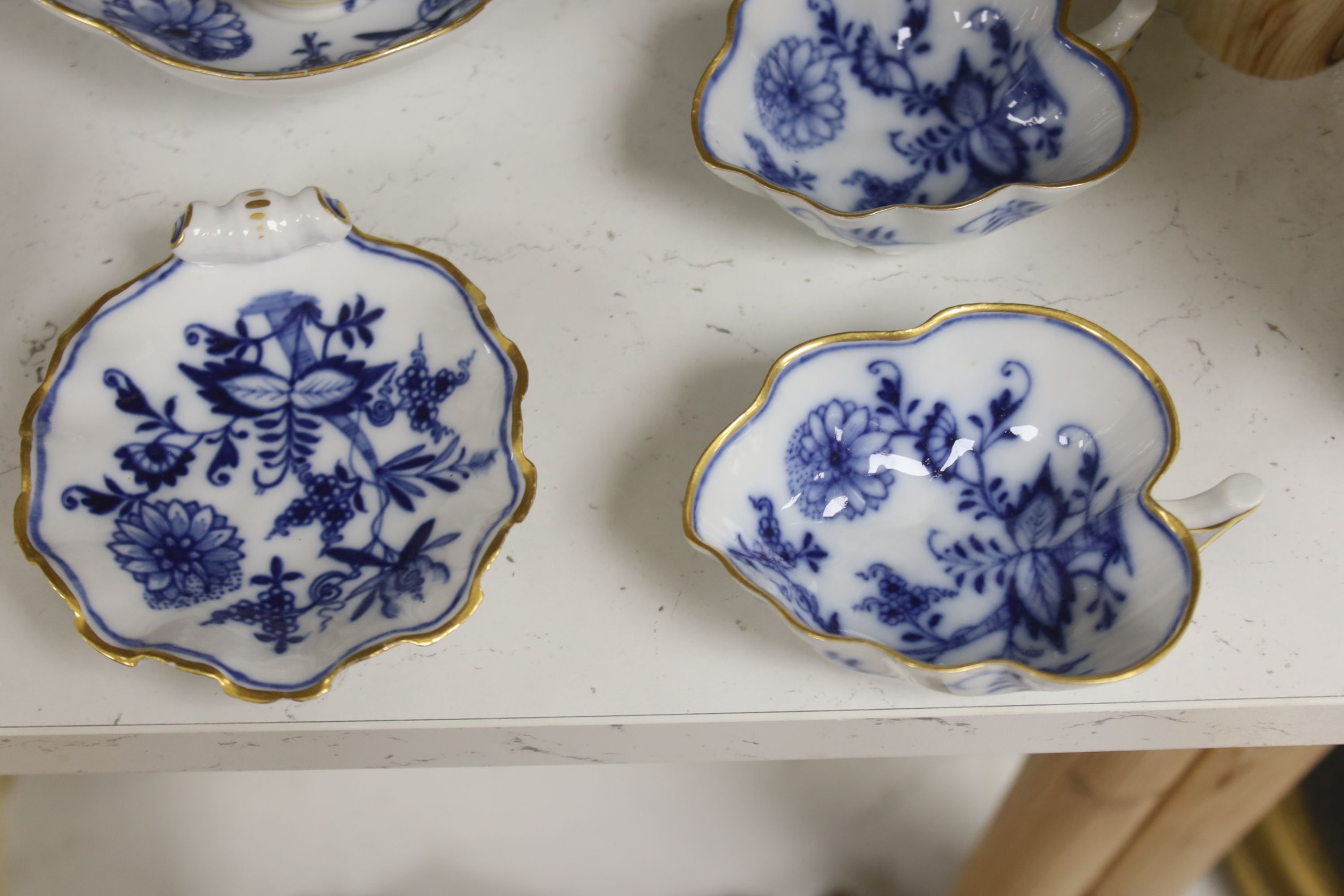 A Meissen blue and white part coffee service and similar leaf shaped dishes